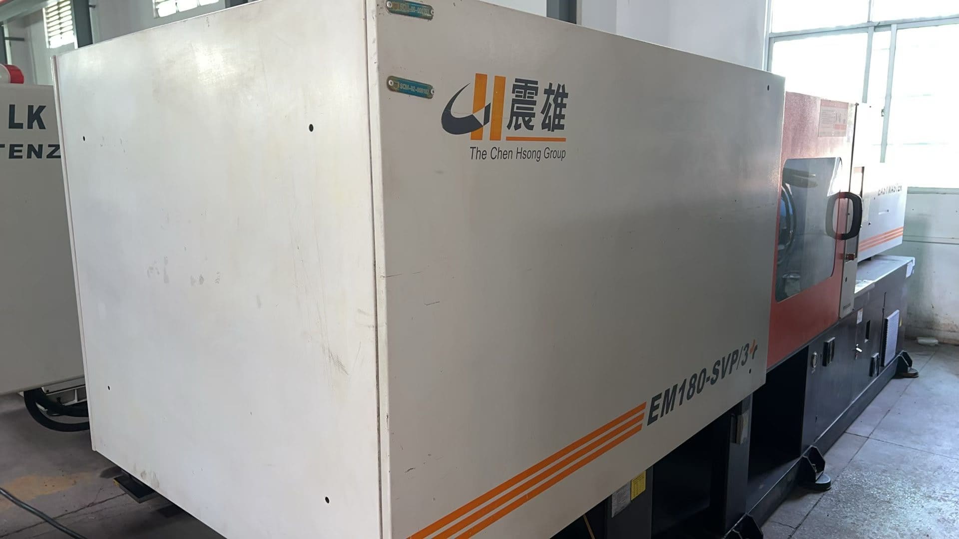 Used 180 Ton EM180-SVP-3 Injection Molding Machine
